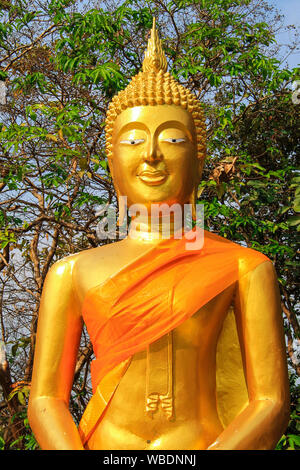 Head of the Golden Buddha in a Thai Buddhist temple, a religious symbol in Thailand, Asia, Asian religion and culture. Tourism, tours in Thailand Stock Photo