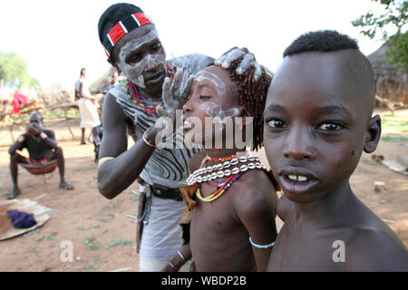 Tribal Hamer boy cattle herder in Turmi, Lower Omo Valley, Ethiopia Stock Photo