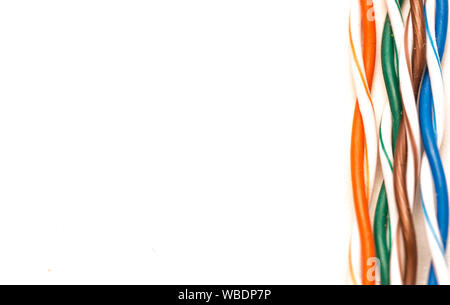 Multi colored twisted network cable isolated on white background Stock Photo