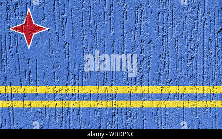 Flag of Aruba close up painted on a cracked wall Stock Photo