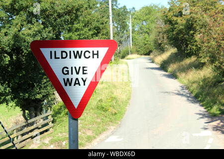 Road sign in Welsh language and in English Stock Photo