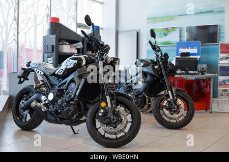 Russia, Izhevsk - August 23, 2019: Yamaha motorcycle shop. New motorbikes and accessories in motorcycle store. Famous world brand. Stock Photo