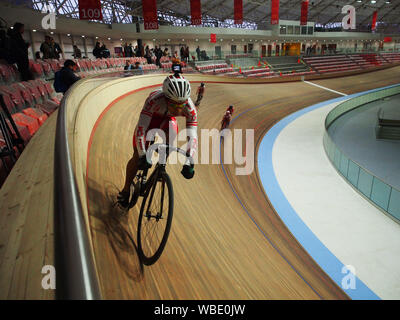 Cyclist riding on the track when Peruvian Cycling Federation receives the new Velodrome and begins its training as a preparation for the Lima 2019 Pan-American Games. Stock Photo