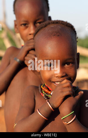 Tribal Hamer boy cattle herder in Turmi, Lower Omo Valley, Ethiopia Stock Photo