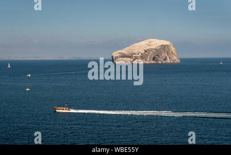 The Bass Rock situated in the Firth of Forth near North Berwick, Scotland. The Rock is home to over 150,000 gannets at the peak of the season. Stock Photo