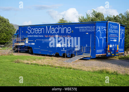 Screen Machine, mobile cinema, touring Highlands & Islands of Scotland. Parked at Battery Park, Lochcarron village, for screening of films. Stock Photo