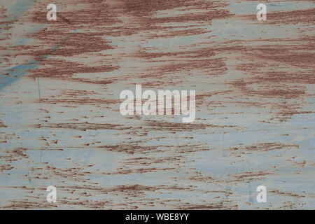 Abstract grunge background. Old rusty metal. Scratches and chips. Glare. Stock Photo