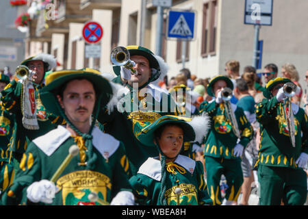 Worms, Germany. 25th August 2019. Members of the Fanfare Corps of the city of Worms march in the parade. The first highlight of the 2019 Backfischfest was the big parade through the city of Worms with over 70 groups and floats. Community groups, music groups and businesses from Worms and further afield took part. Stock Photo