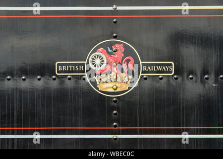 CRANMORE, ENGLAND - JULY 2019: Close up view of the old British Railways logo on the side of a steam engine on the East Somerset Railway. Stock Photo