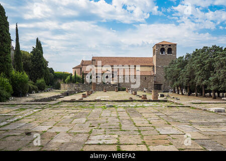 Panoramic view of San Giusto Cathedral and Roman forum ruins in Trieste, Northern Italy Stock Photo