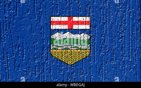 Flag of Alberta close up painted on a cracked wall Stock Photo