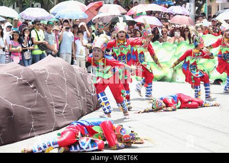 Davao City, Philippines-August 2014: Emotional performance of streetdancers at the Kadawayan festival.   Kadayawan is celebrated August each year to g Stock Photo