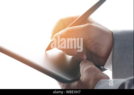 Web digital signature theme. Close up of hand with tablets Stock Photo