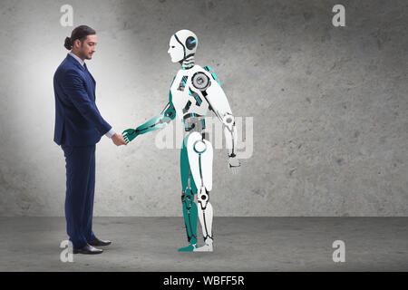 The concept of cooperation between humans and robots Stock Photo