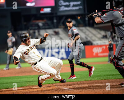 August 26, 2019: San Francisco Giants pinch hitter Stephen Vogt (21) scores on Kevin Pillar's (not shown) ninth inning double, during a MLB game between the Arizona Diamondbacks and the San Francisco Giants at Oracle Park in San Francisco, California. Valerie Shoaps/CSM Stock Photo