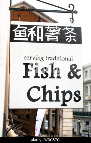 Fish and Chips restaurant sign, in English and Korean. Windsor, England, High Street Stock Photo