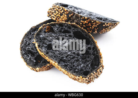 Homemade sourdough black bread baguette on white background. Food and baking. Stock Photo