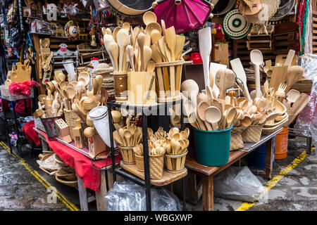 Cuenca, Ecuador - Nov 16, 2012: Market stall sells wooden kitchen ...