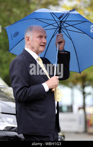 FILED - 18 September 2012, Lower Saxony, Hanover: Ferdinand Piech, then Chairman of the Supervisory Board of Volkswagen AG, holds an umbrella at the International Motor Show for Commercial Vehicles. The long-standing VW CEO and supervisory board chairman is dead. He died at the age of 82, as was confirmed to the Deutsche Presse-Agentur from well-informed circles. First the 'Bild' newspaper had reported about it. Photo: Friso Gentsch/dpa Stock Photo