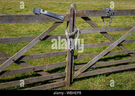 Padlocked Metal and Wooden Farm Gates Protecting Livestock,Pastures and ...