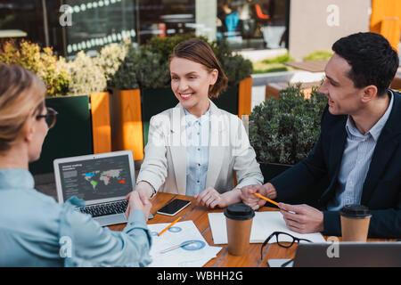 Business partners making an agreement on cooperation Stock Photo