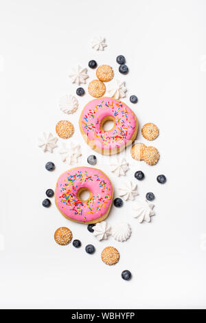 Fresh sweet bonuts on white studio background Stock Photo
