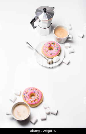 Fresh hot coffe and pink sweet donut on white background isolated Stock Photo