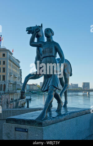 Statue of woman and horse on Middle Rhine Bridge (Mittlere Brucke). Basel, Switzerland Stock Photo