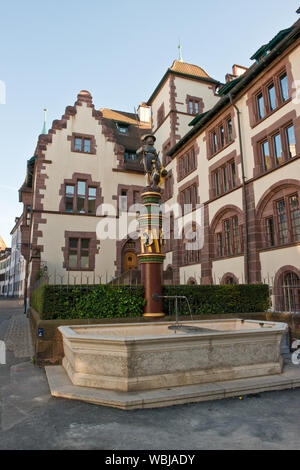 Staatsarchiv Basel-Stadt (archive offices). Fountian and statue. Old Town, Basel, Switzerland Stock Photo