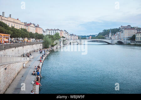 LYON, FRANCE - JULY 17, 2019: Panorama of Saone river and the Quais de Saone riverbank and riverside in the city center of Lyon, with a focus on the P Stock Photo