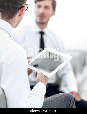 close up.two employees discussing a new idea Stock Photo