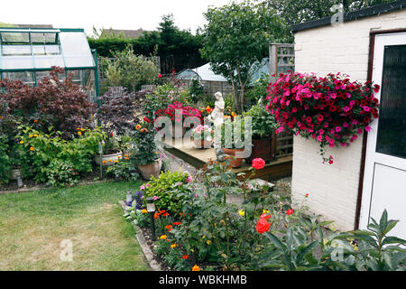 SMALL RURAL BACK GARDEN IN SUMMER Stock Photo