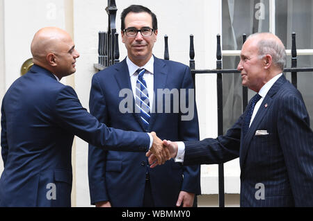 (left to right) Chancellor Sajid Javid welcomes US Secretary of the Treasury Steven Mnuchin and Director of the National Economic Council, Larry Kudlow, ahead of a meeting at Downing Street, London. Stock Photo