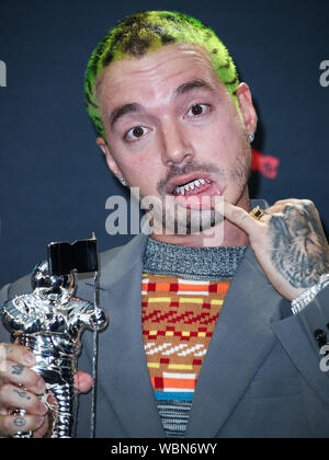 Newarke, USA. 26th Aug, 2019. J Balvin poses in the press room at the 2019 MTV Video Music Awards held at the Prudential Center on August 26, 2019 in Newark, New Jersey, United States. Credit: Image Press Agency/Alamy Live News Stock Photo