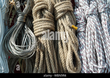 Rope background. roll of different ropes Stock Photo