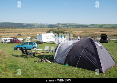 Camping,caravan park,Borth,holiday,seaside,resort,north,of,Aberystwyth,Cardigan Bay,Ceredigion,on,sunny,Bank Holiday,weekend,August,summer,Wales Stock Photo