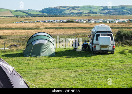 Camping,caravan park,Borth,holiday,seaside,resort,north,of,Aberystwyth,Cardigan Bay,Ceredigion,on,sunny,Bank Holiday,weekend,August,summer,Wales Stock Photo