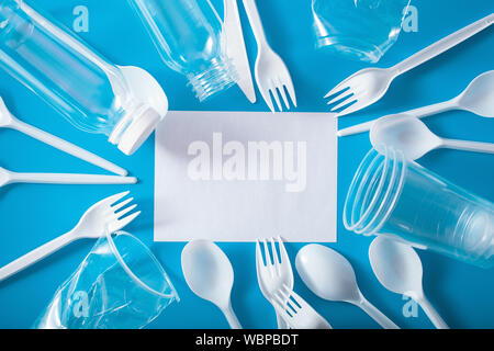 single use plastic cups, forks, spoons, bottles. concept of recycling plastic, plastic waste Stock Photo