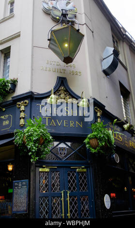 The Ship Tavern is a Mahogany-panelled 16th century pub with traditional real-ale bar and upstairs dining room located in a quiet corner of Holborn. Stock Photo