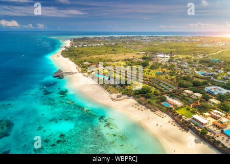 Aerial view of beautiful tropical sea coast at sunset in summer Stock Photo