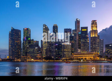 The Central Business District (CBD) at dusk from Marina Bay, Singapore Stock Photo