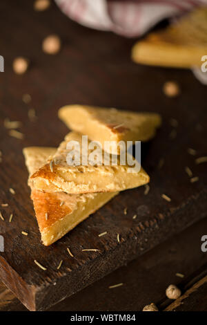Sliced Chickpea Omelet on Wooden Surface Stock Photo