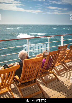 Cunard's Queen Mary 2 sailing up Southampton water at dawn Stock Photo ...