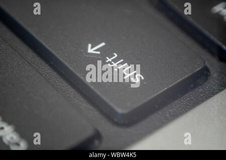 Extreme macro of the shift key on a laptop keyboard Stock Photo