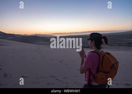 Khongoryn Els also called Duut Mankhan is popularly known as the 'Singing Sands'. The sand dunes extend to over 965 square kilometres area and rising Stock Photo