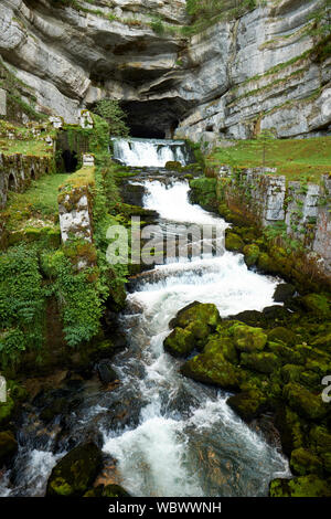Source de la Loue - The source of the river Loue and karst limestone near Ouhans in Doubs France. Stock Photo