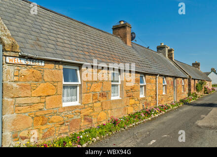 DORNOCH SUTHERLAND SCOTLAND HOUSES AND GARDEN OF LITTLE TOWN IN WELL STREET BUILT CIRCA 1850 Stock Photo