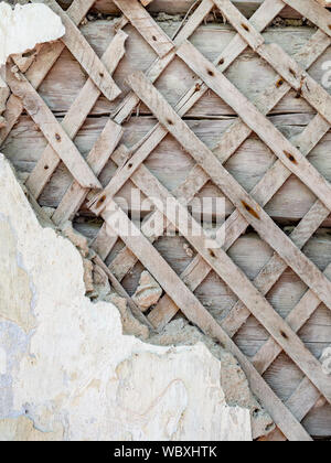 Old wooden shingled plaster wall Stock Photo