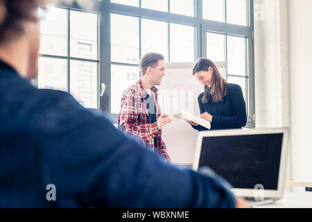 Students brainstorming during an interactive class Stock Photo