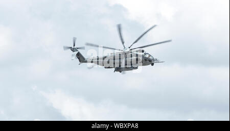 BEAUFORT, SOUTH CAROLINA-APRIL 20, 2017: A CH-53E Super Stallion helicopter flies and banks over the Marine Corp Air Station in Beaufort, South Caroli Stock Photo